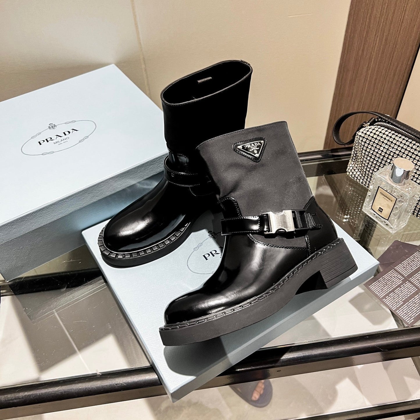 ANKLE BOOTS WITH STRAP IN BLACK CALFSKIN