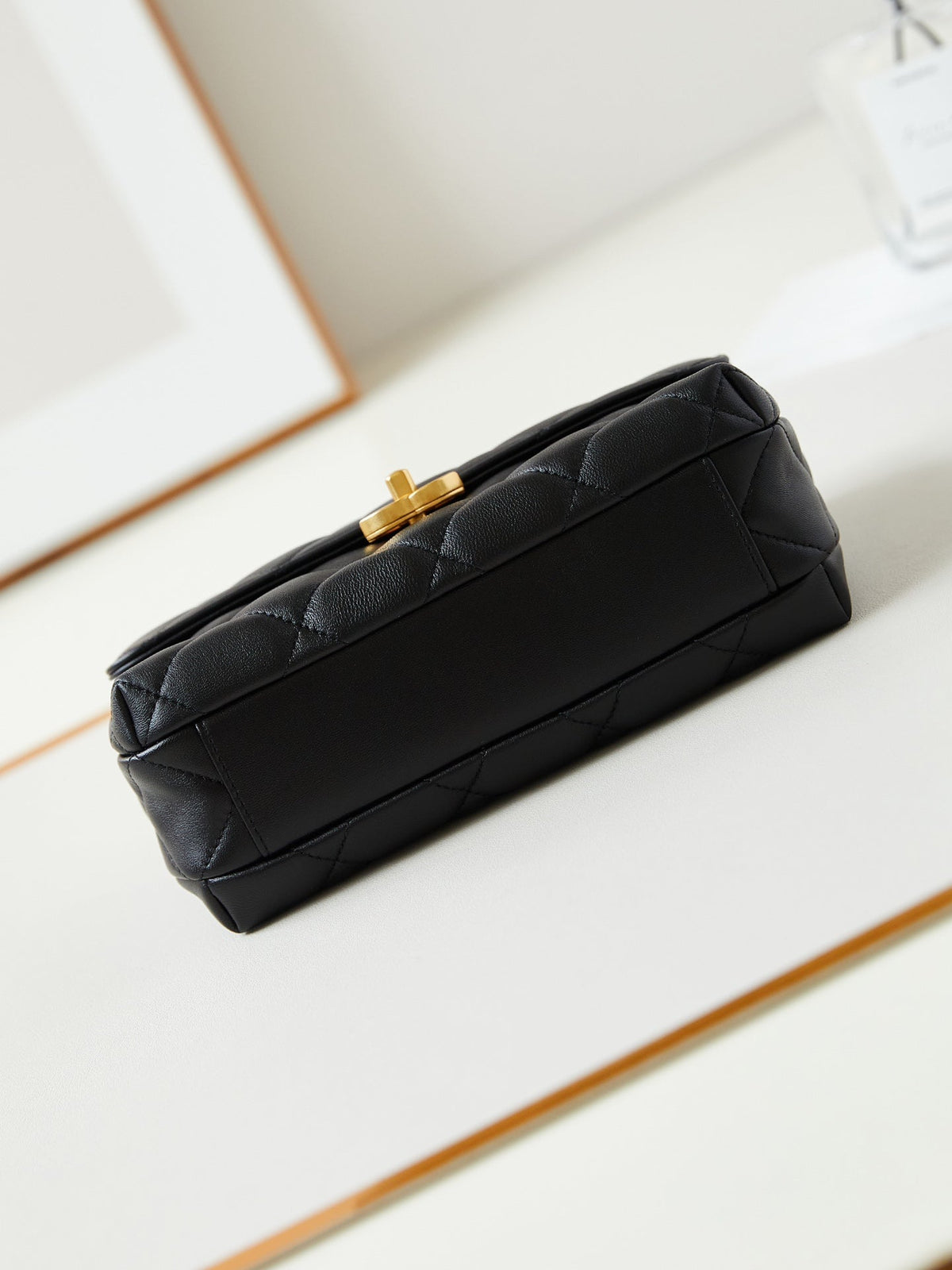 24a small flap bag 23cm black lambskin pearl and gold hardware