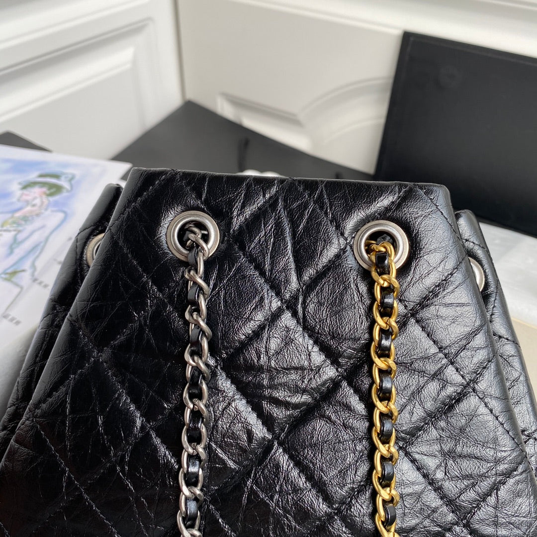 Chanel 2025 Aged Quilted Gabrielle Backpack 24cm Black Calfskin 534712